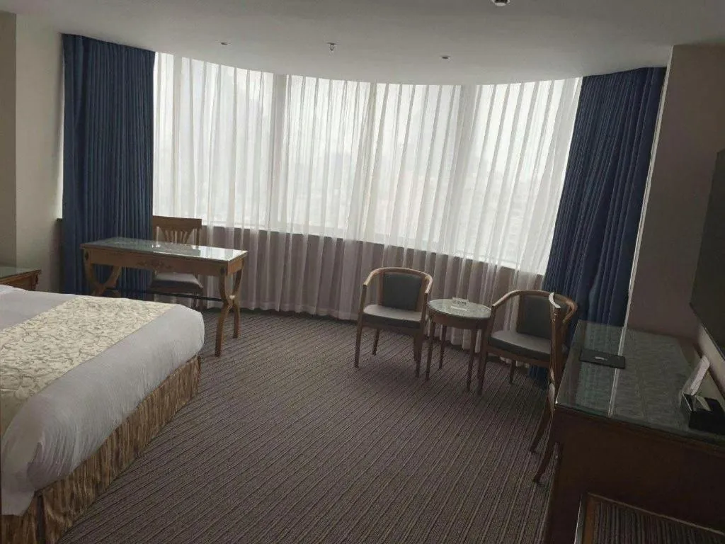 Bed in Wuhan Asia Hotel