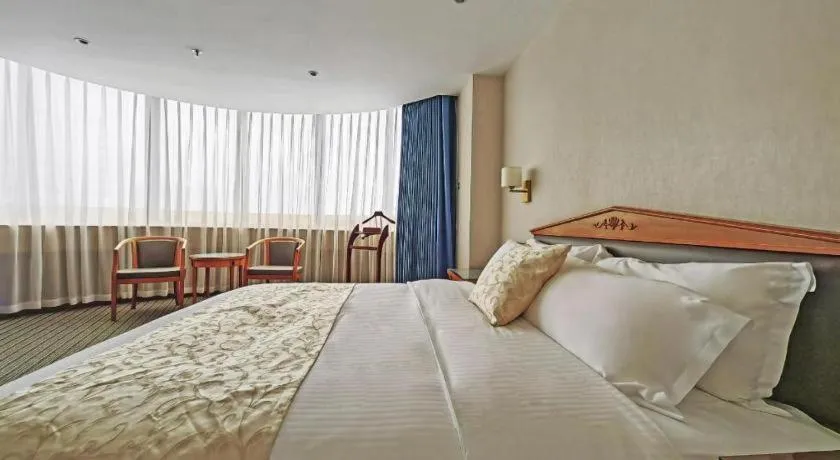 Bed in Wuhan Asia Hotel