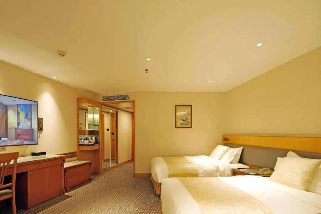 Bed in Wuhan Asia Hotel