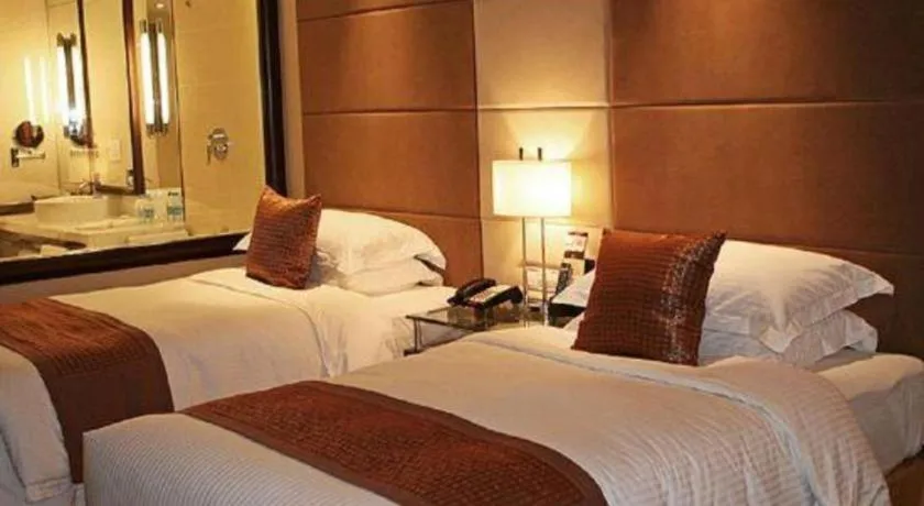 Bed in Beijing Liaoning Hotel