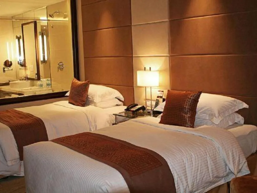 Bed in Beijing Liaoning Hotel