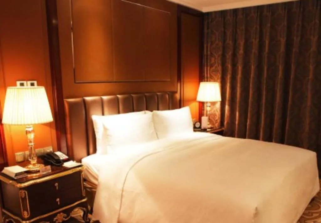Bed in Beijing Liaoning Hotel