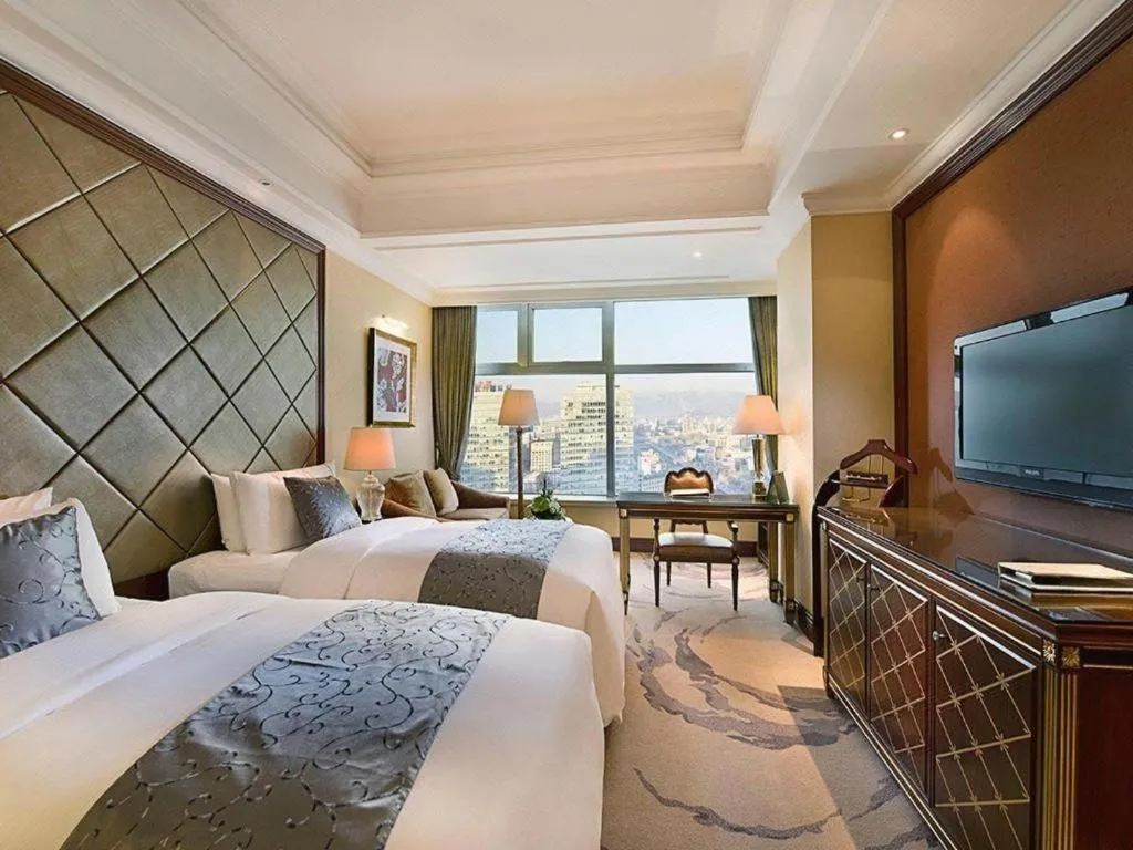 Bed in Beijing Liaoning Hotel