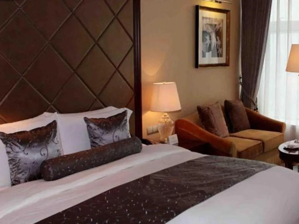 Bed in Beijing Liaoning Hotel