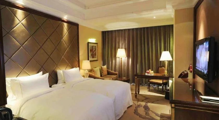 Bed in Beijing Liaoning Hotel