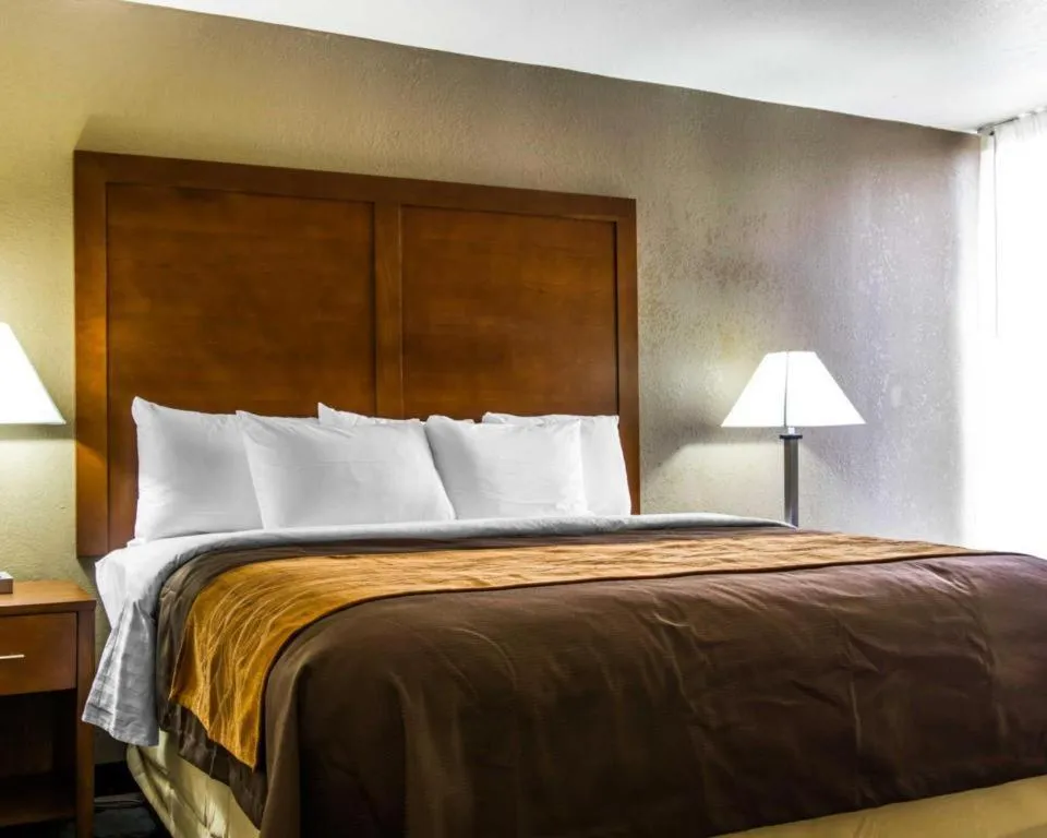 Bed in AmericInn by Wyndham Memphis East