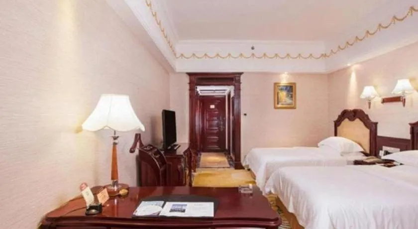 Bed in Changsha Mingchen International Hotel