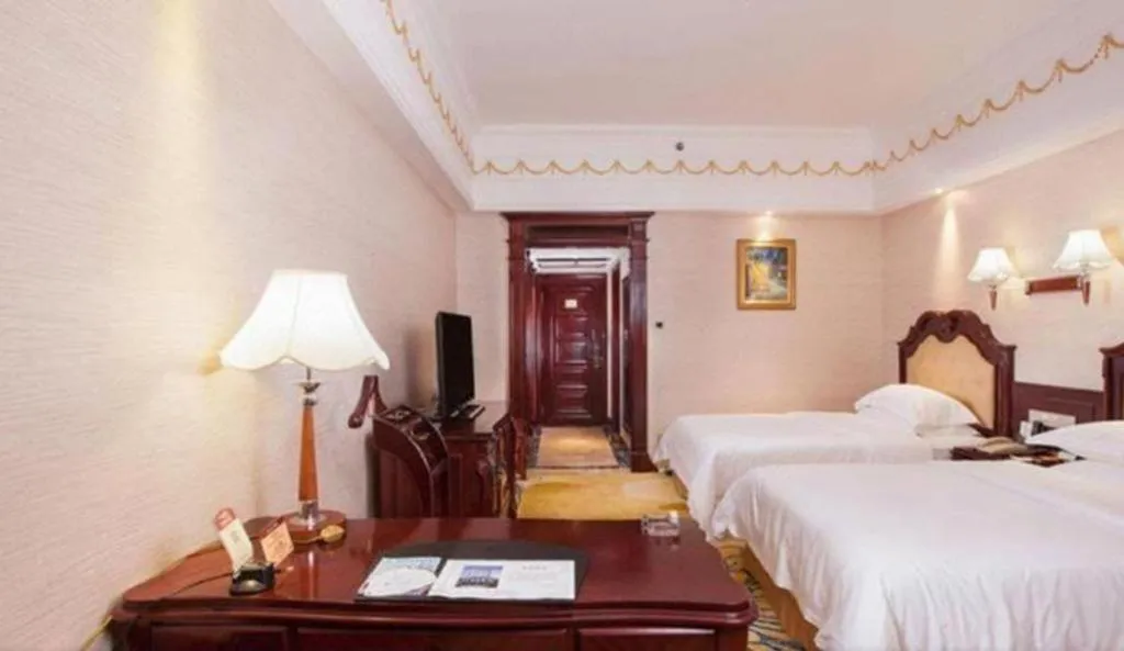 Bed in Changsha Mingchen International Hotel