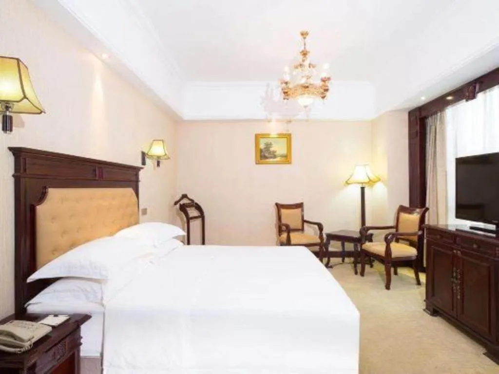 Bed in Changsha Mingchen International Hotel