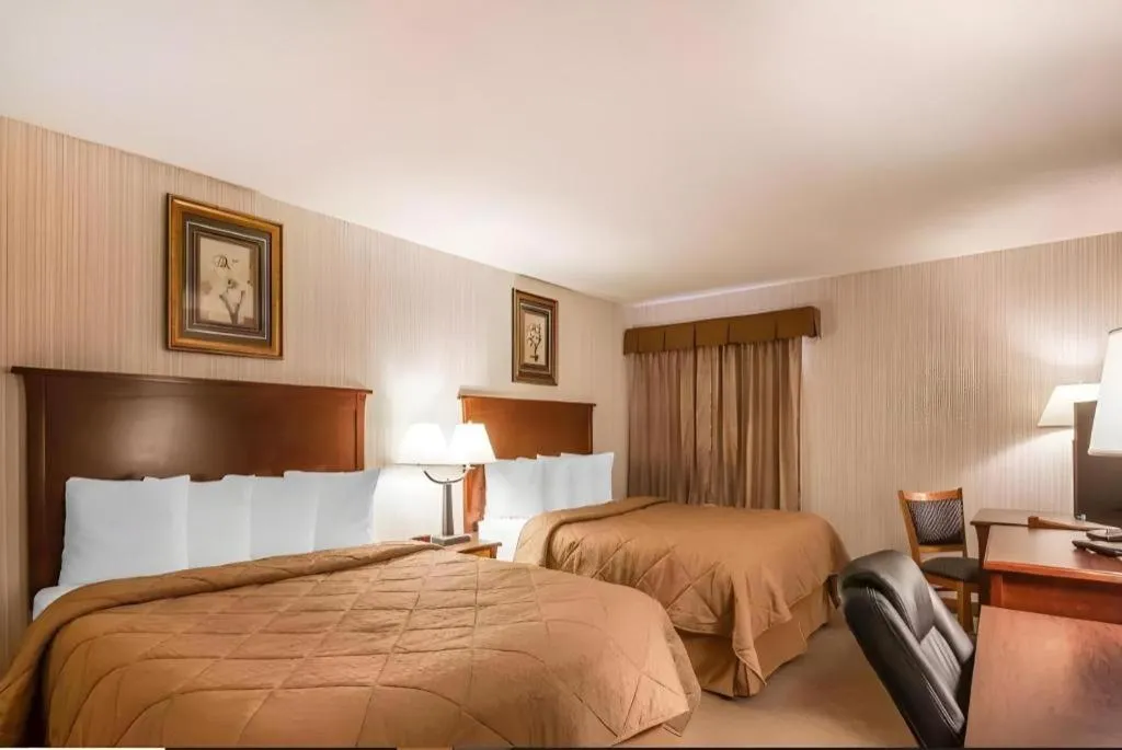 Bed in Quality Inn & Conference Centre