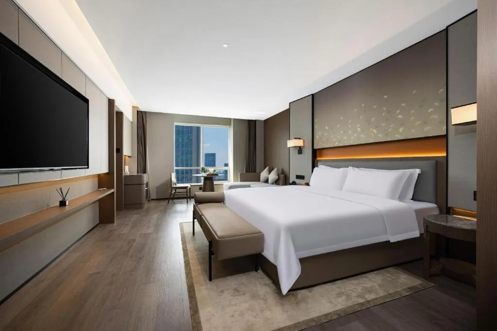 Bed in Changsha Xiaoxiang Huatian Hotel