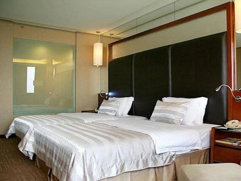 Bed in Changsha Xiaoxiang Huatian Hotel