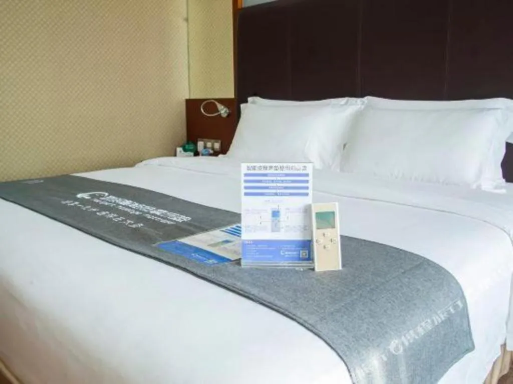 Bed in Changsha Xiaoxiang Huatian Hotel