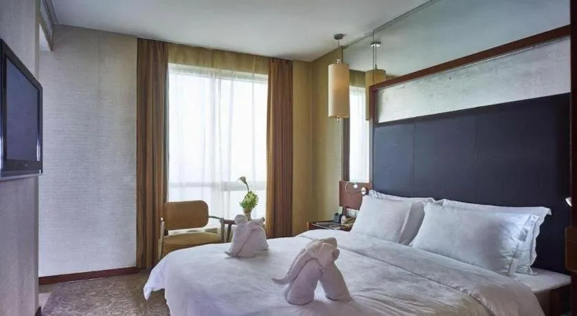 Bed in Changsha Xiaoxiang Huatian Hotel