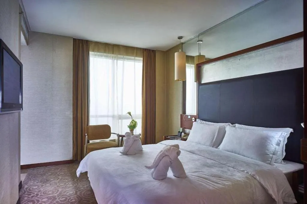 Bed in Changsha Xiaoxiang Huatian Hotel