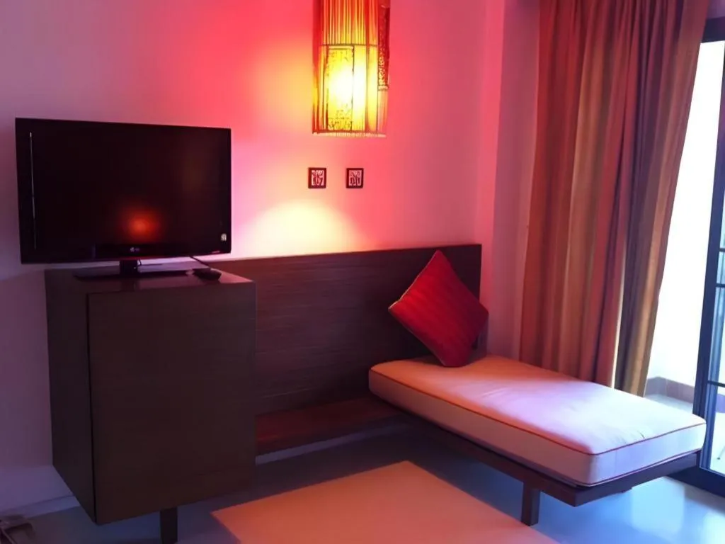 Bed in PhoomThai Garden Hotel