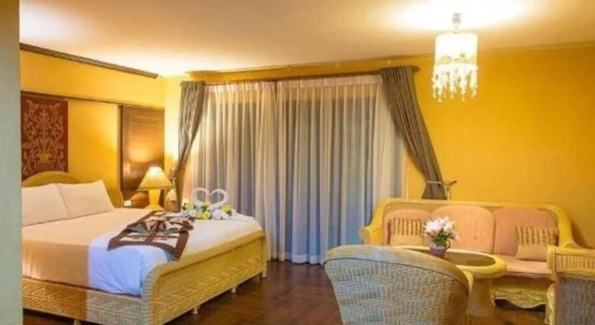 Bed in PhoomThai Garden Hotel