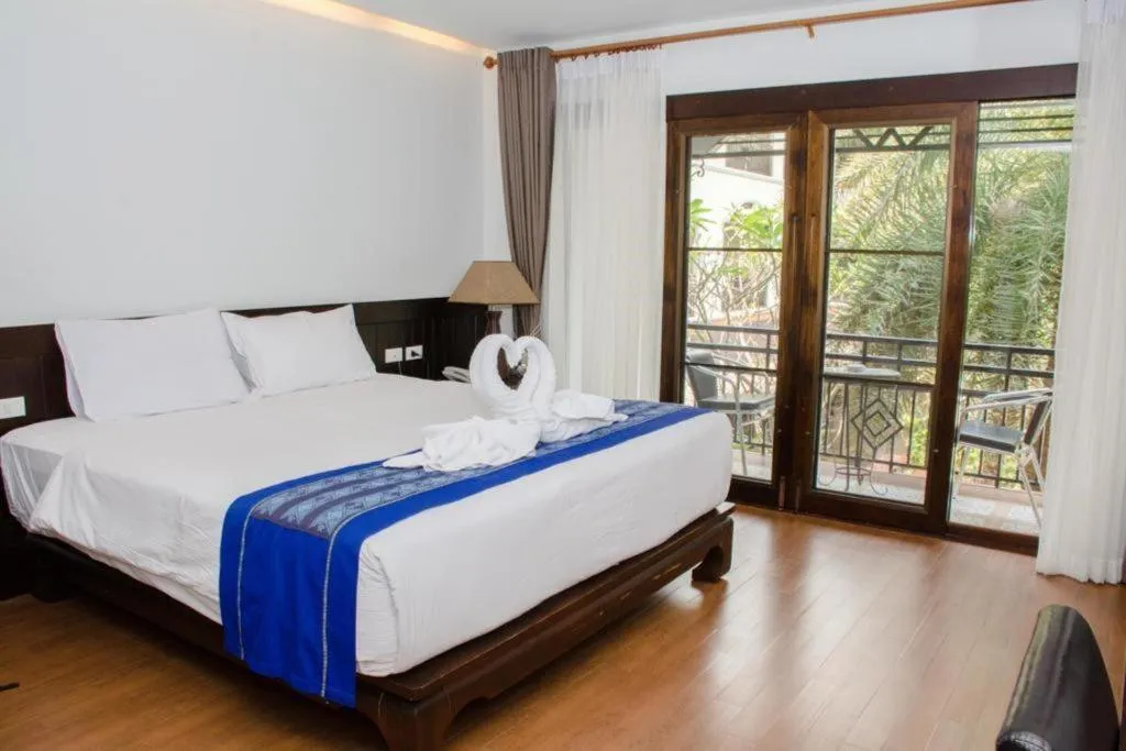 Bed in PhoomThai Garden Hotel