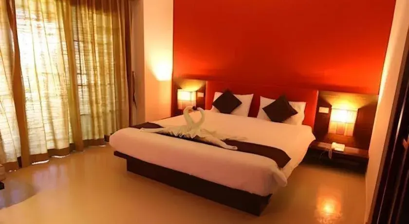 Bed in PhoomThai Garden Hotel Bed in PhoomThai Garden Hotel