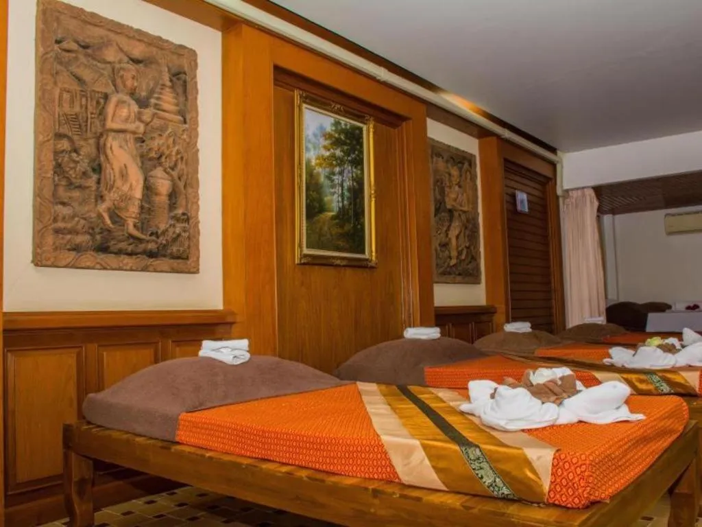 Bed in PhoomThai Garden Hotel