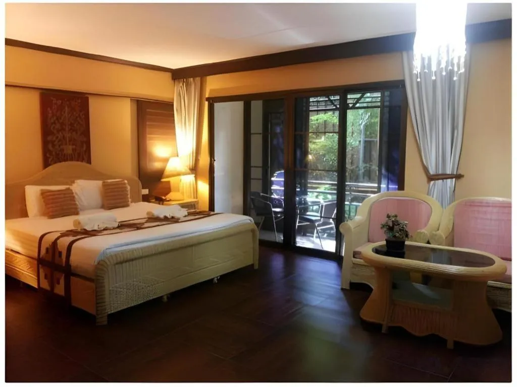 Bed in PhoomThai Garden Hotel