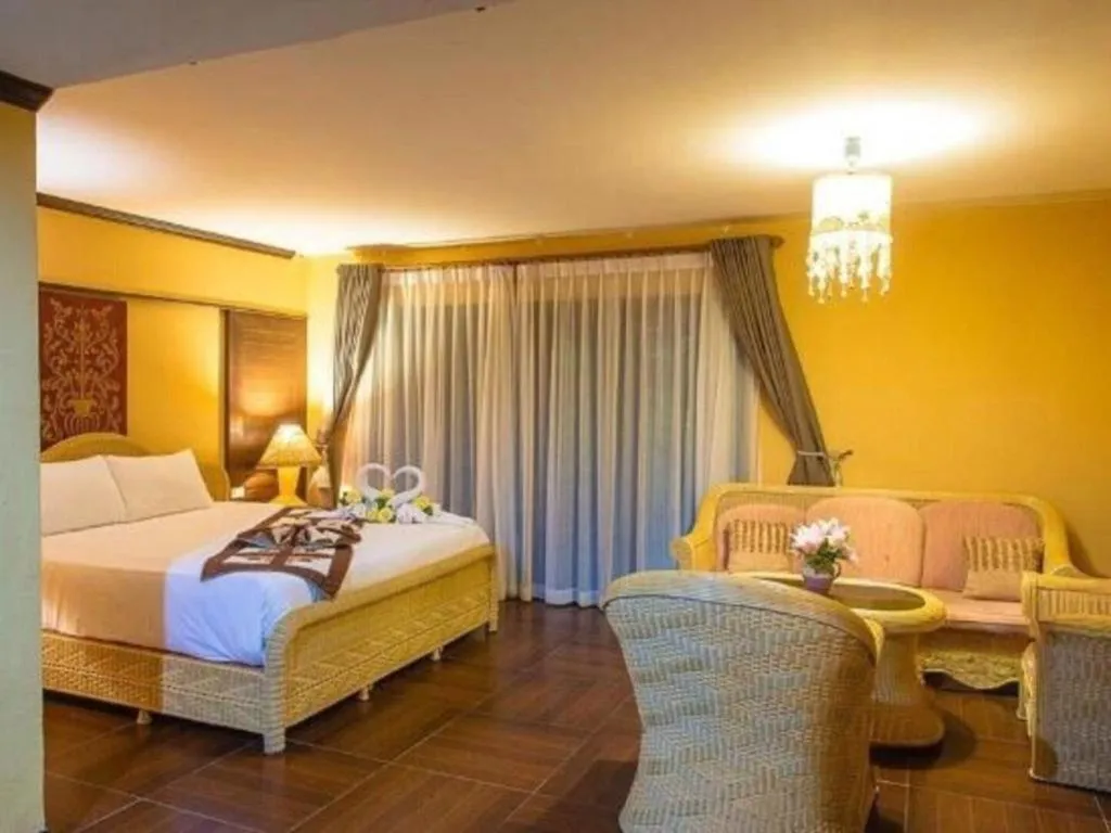 Bed in PhoomThai Garden Hotel