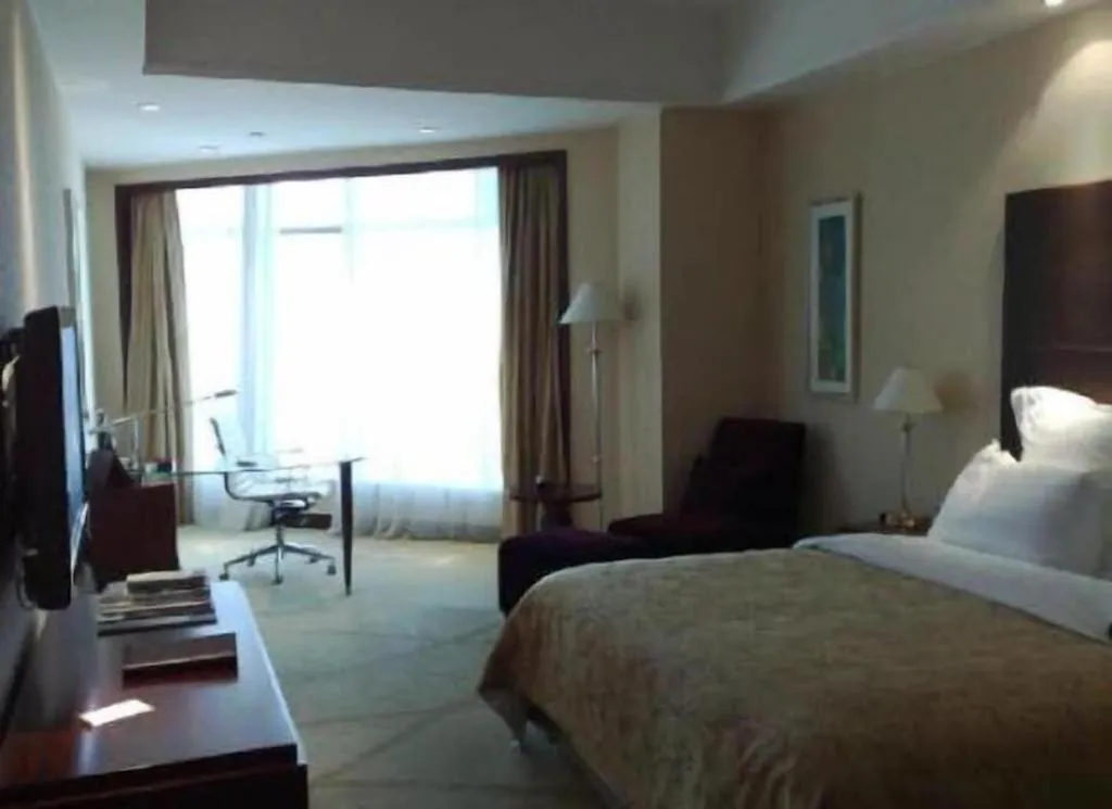 Bed in New Century Grand Hotel Zhuji Yaojiang