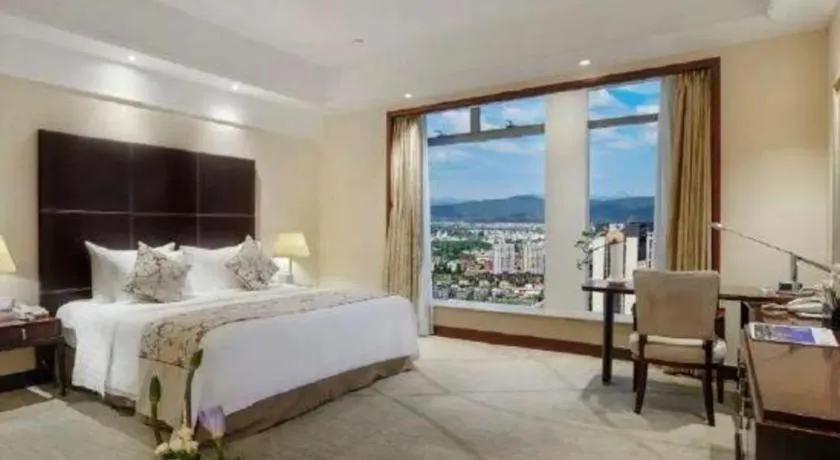 Bed in New Century Grand Hotel Zhuji Yaojiang
