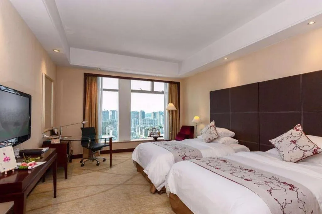 Bed in New Century Grand Hotel Zhuji Yaojiang