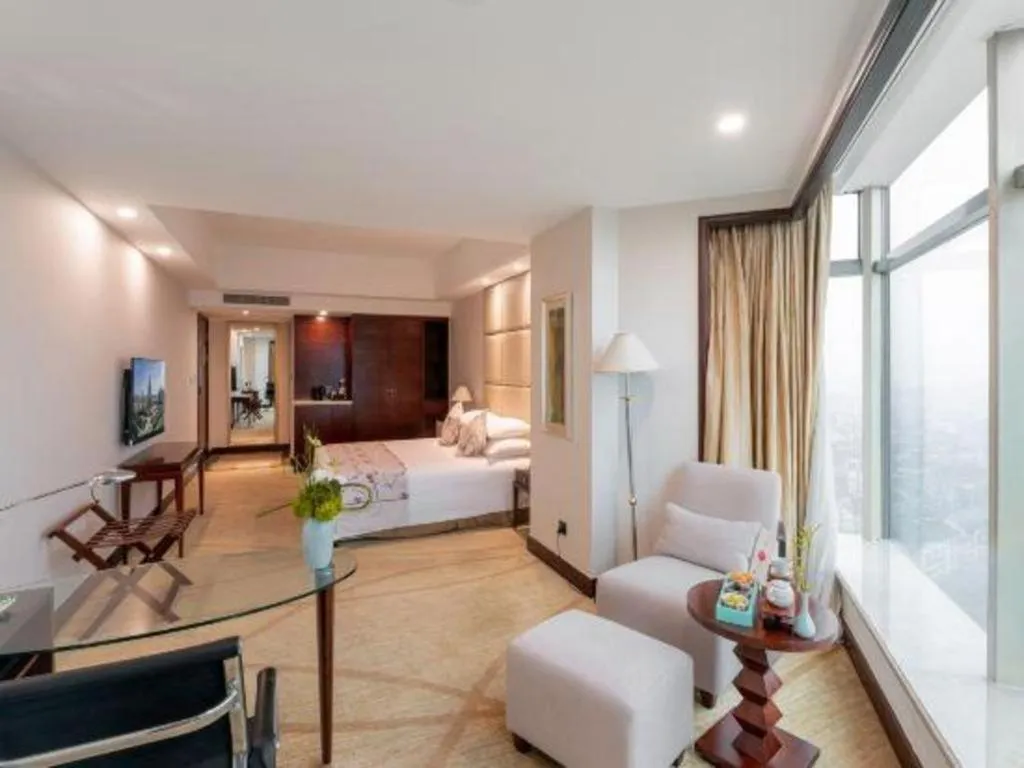 Bed in New Century Grand Hotel Zhuji Yaojiang