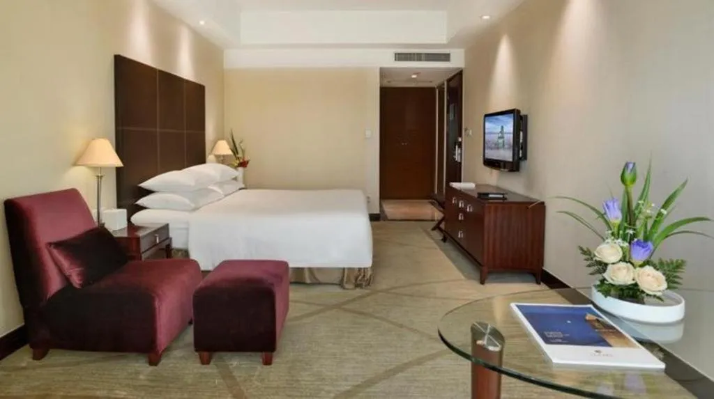 Bed in New Century Grand Hotel Zhuji Yaojiang