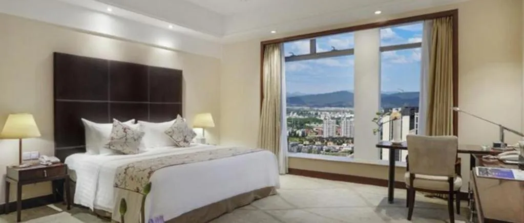 Bed in New Century Grand Hotel Zhuji Yaojiang