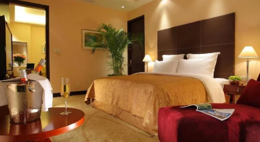 Bed in New Century Grand Hotel Zhuji Yaojiang