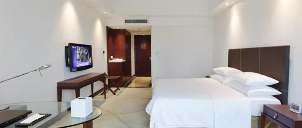 Bed in New Century Grand Hotel Zhuji Yaojiang