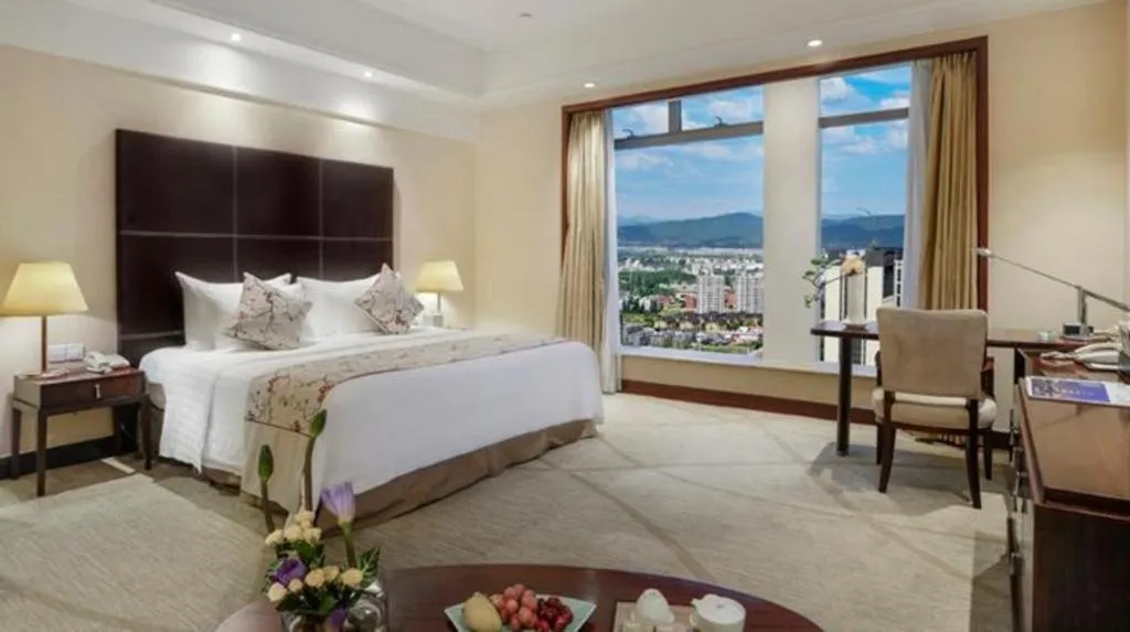 Bed in New Century Grand Hotel Zhuji Yaojiang