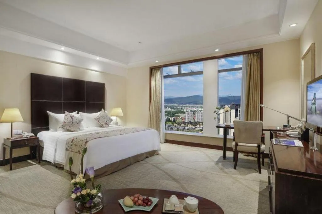 Bed in New Century Grand Hotel Zhuji Yaojiang