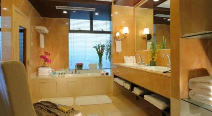 Bed in New Century Grand Hotel Zhuji Yaojiang