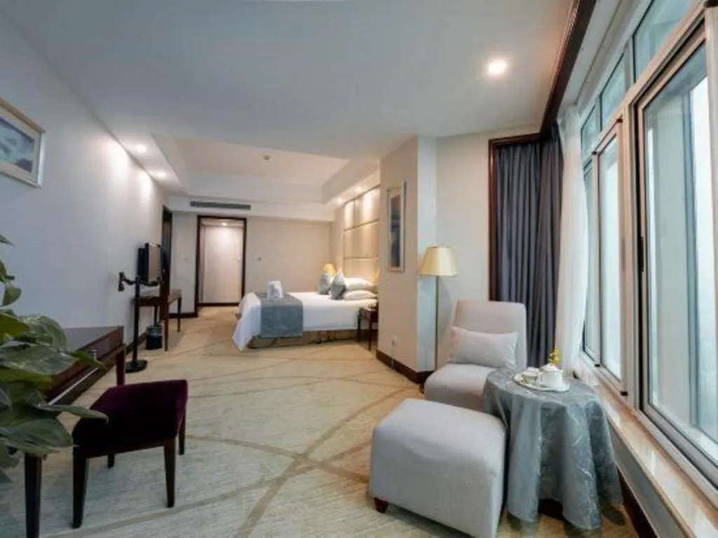 Bed in New Century Grand Hotel Zhuji Yaojiang