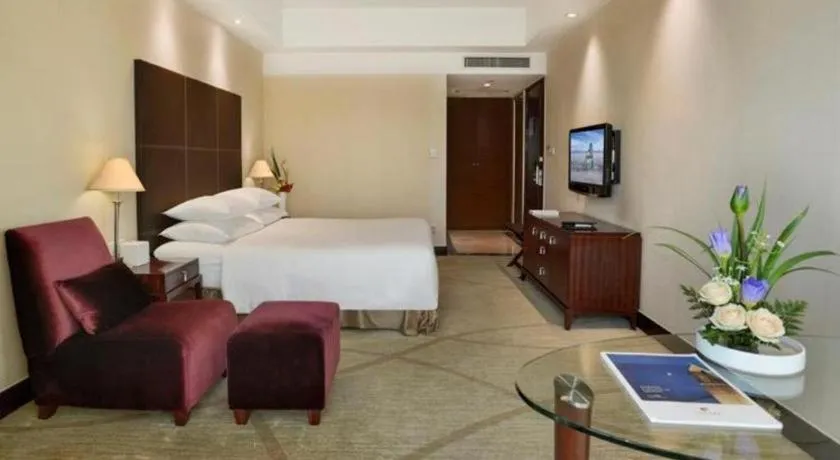 Bed in New Century Grand Hotel Zhuji Yaojiang