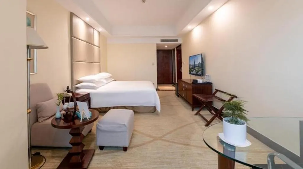 Bed in New Century Grand Hotel Zhuji Yaojiang