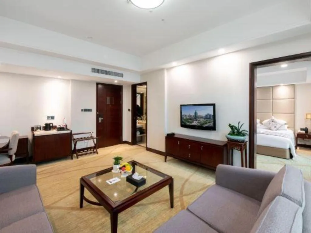 Bed in New Century Grand Hotel Zhuji Yaojiang