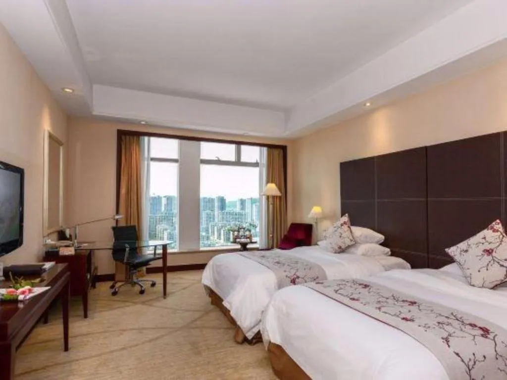 Bed in New Century Grand Hotel Zhuji Yaojiang
