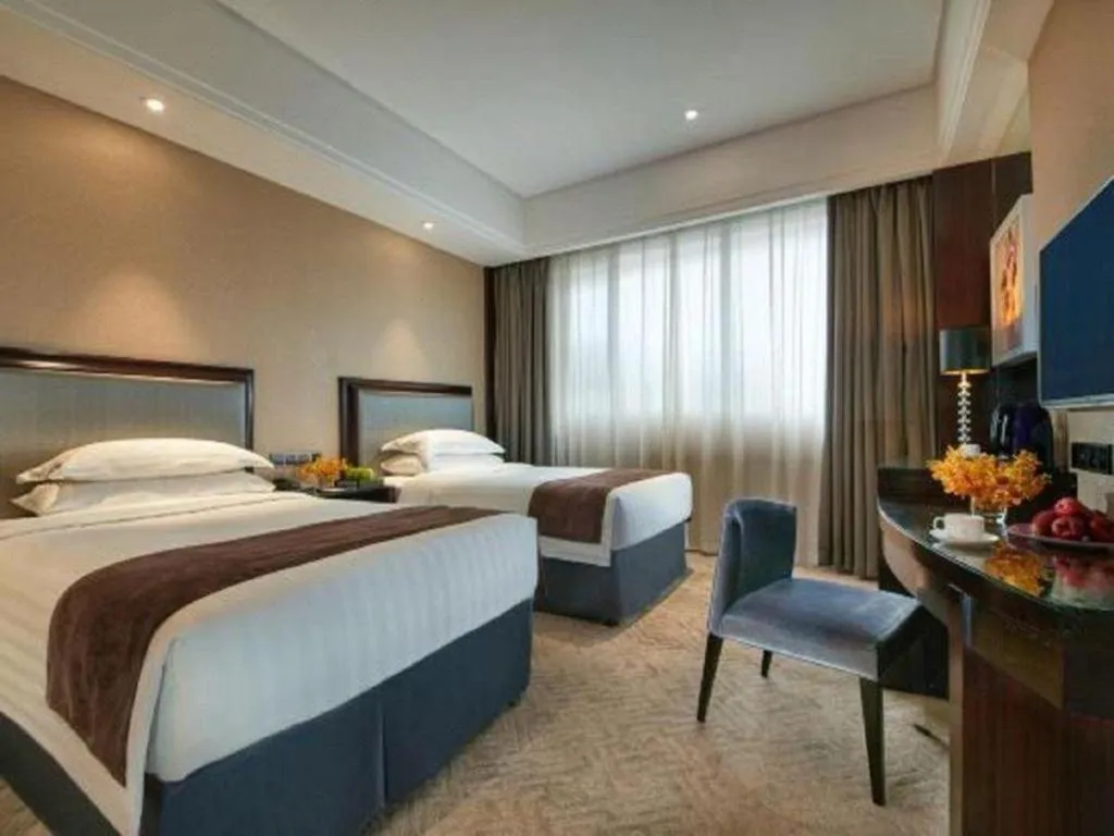 Bed in New Century Manju Hotel Shanghai New International Expo Center