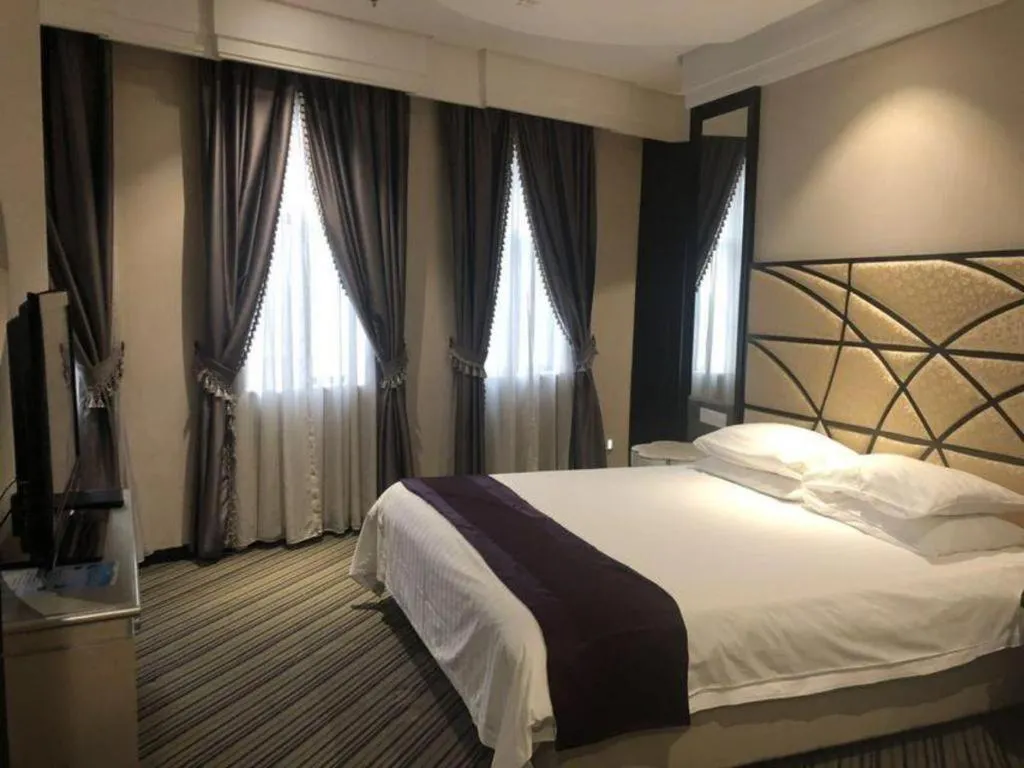 Bed in New Century Manju Hotel Shanghai New International Expo Center