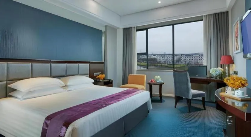 Bed in New Century Manju Hotel Shanghai New International Expo Center