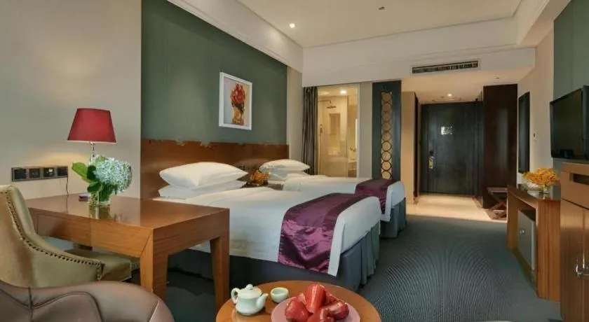 Bed in New Century Manju Hotel Shanghai New International Expo Center