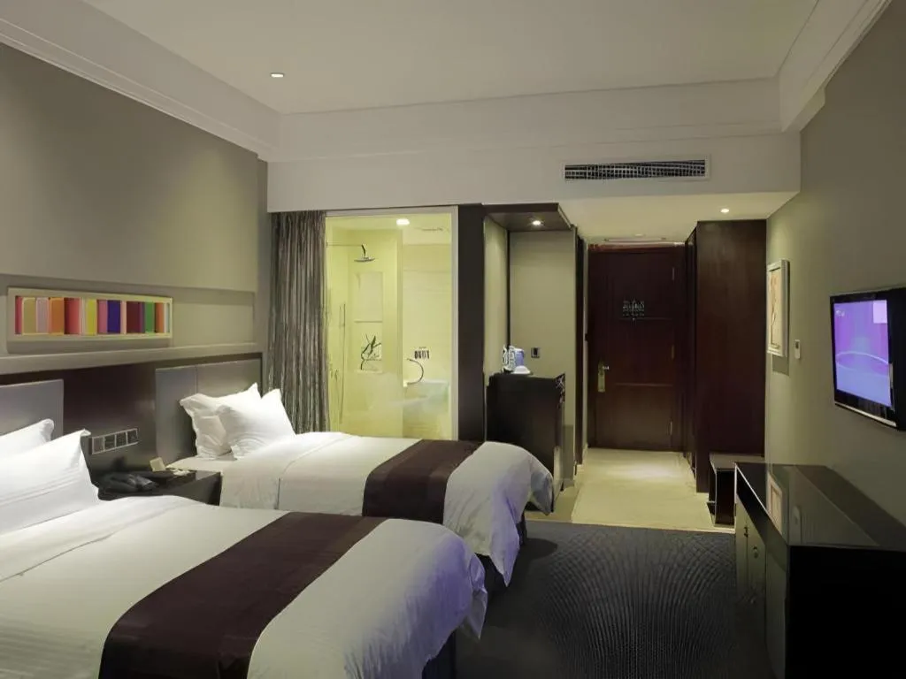 Bed in New Century Manju Hotel Shanghai New International Expo Center