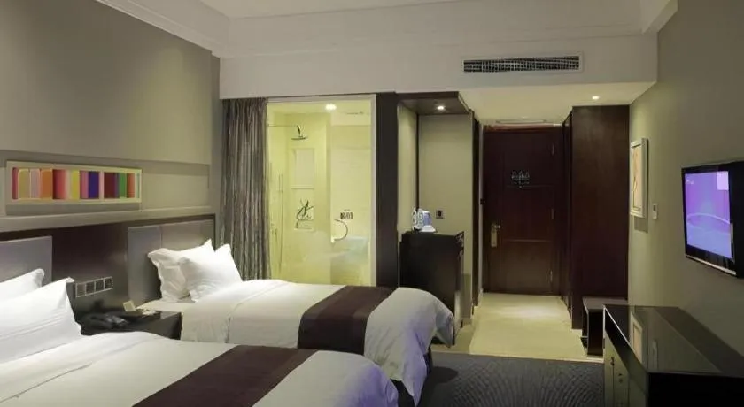 Bed in New Century Manju Hotel Shanghai New International Expo Center