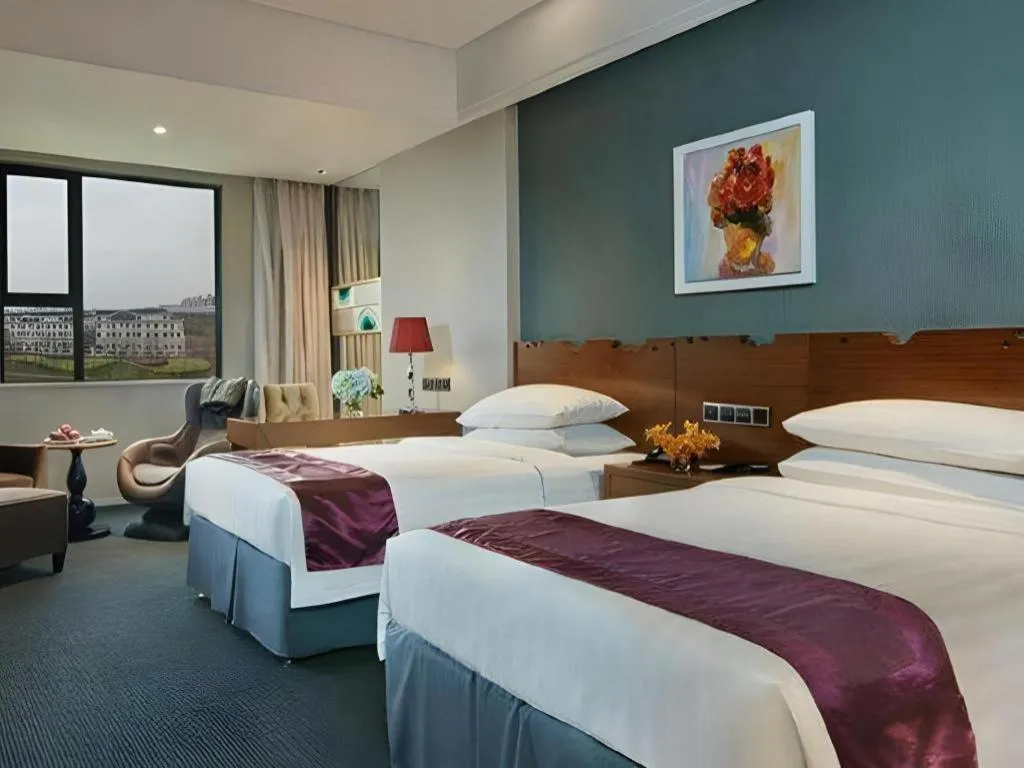 Bed in New Century Manju Hotel Shanghai New International Expo Center