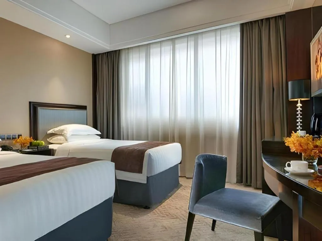 Bed in New Century Manju Hotel Shanghai New International Expo Center